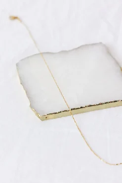 Exit Stage Left Necklace Gold